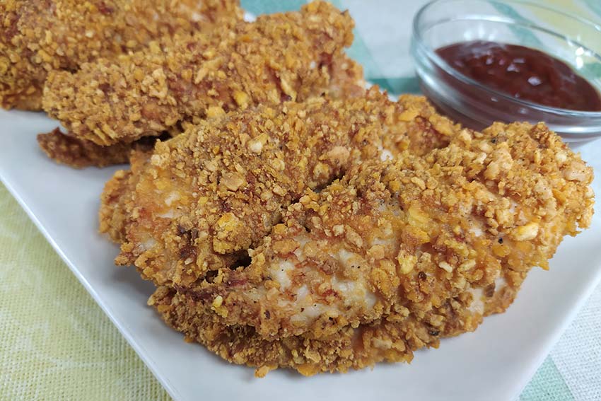 Solomillos De Pollo Rebozados Con Kikos Recetas De La Abuela