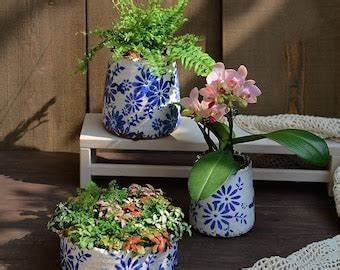 16 fantastici vasi per fiori ‘fai da te’ che porteranno vita nella tua casa.