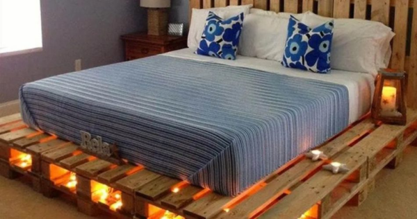 Por que comprar uma cama quando você pode usar paletes para fazer uma? Aqui estão 13 ótimas ideias