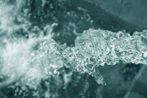 Watering equipment pumped into irrigation canal.