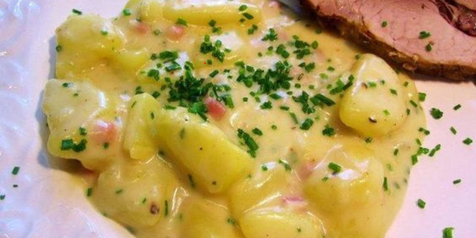 “Wie bereiten Sie köstliche Bechamel-Kartoffeln zu, die cremig und würzig sind?”