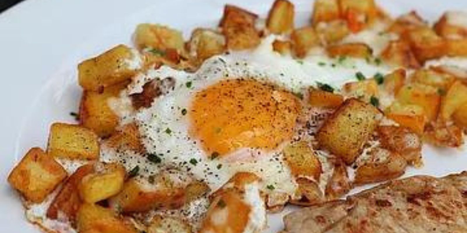 Bratkartoffeln mit Ei und Käse