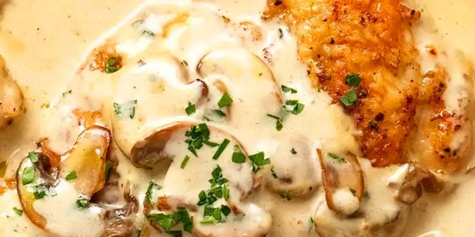 Gratinierte Hähnchenfilets in Champignonrahm Rezept