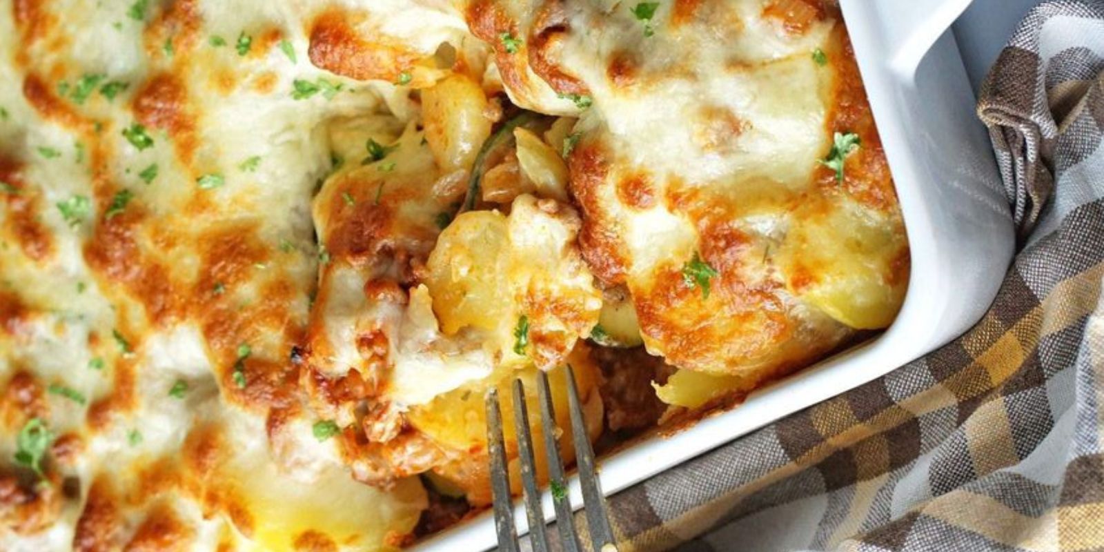 Hier ist ein einfaches Rezept für einen Blumenkohl-Kartoffel-Auflauf: