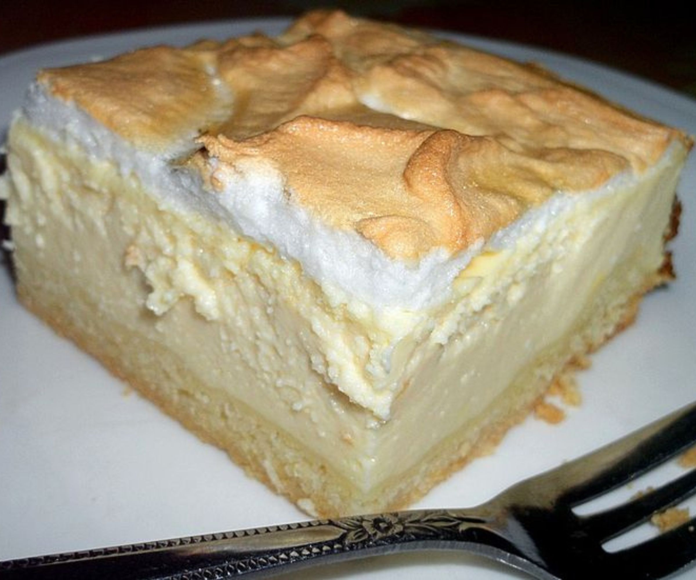 Quarkkuchen vom Blech mit Vanillepudding: Ein unwiderstehlicher Genuss