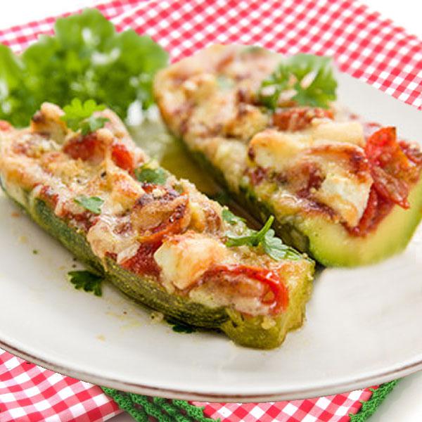 Calabacines rellenos de tomate y queso Calabacines rellenos de tomate y queso