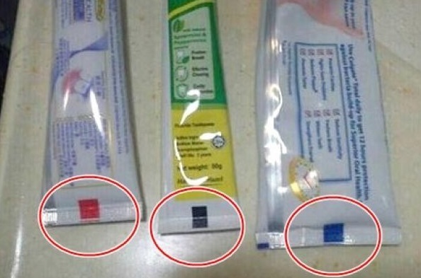 Que signifient les petites bandes sur les tubes de dentifrices ?