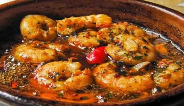 Succombez aux Délices Marins : Recette Rapide de Crevettes Sautées à l’Ail et au Persil