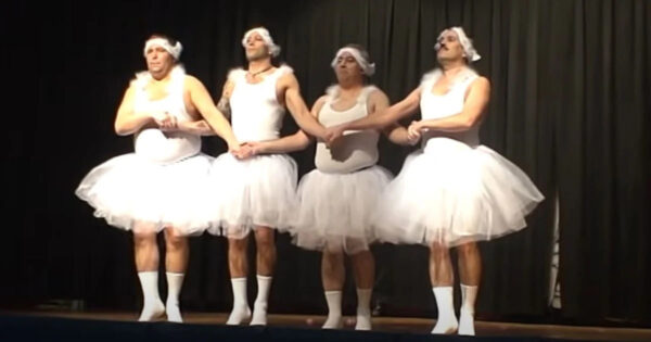 4 Dads grasp hands and perform comical dance that leaves crowd in pieces