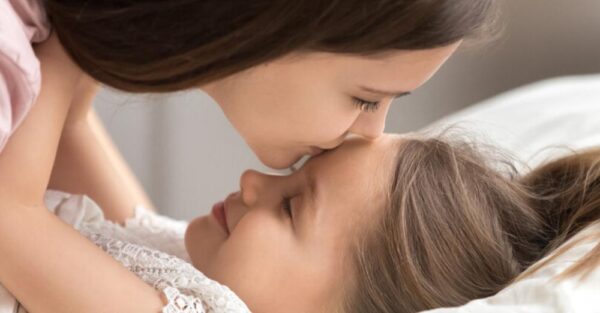 Giving your child a good night kiss is more important than you think