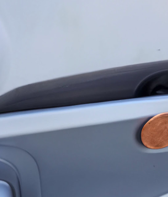 Here’s what it means if you spot a penny lodged in your car door handle